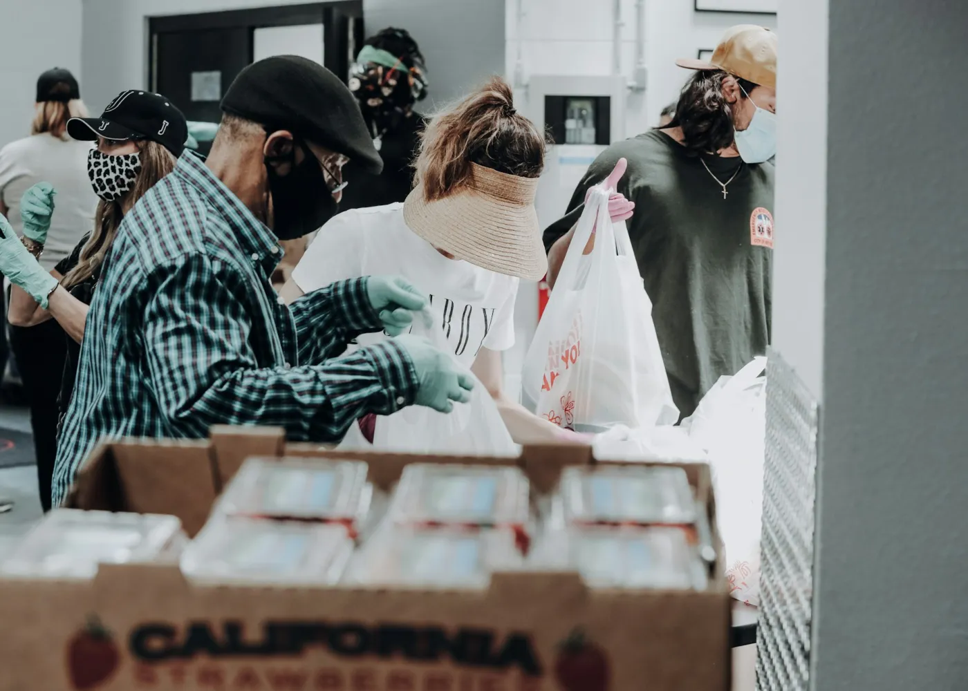 Volunteers packing food bags