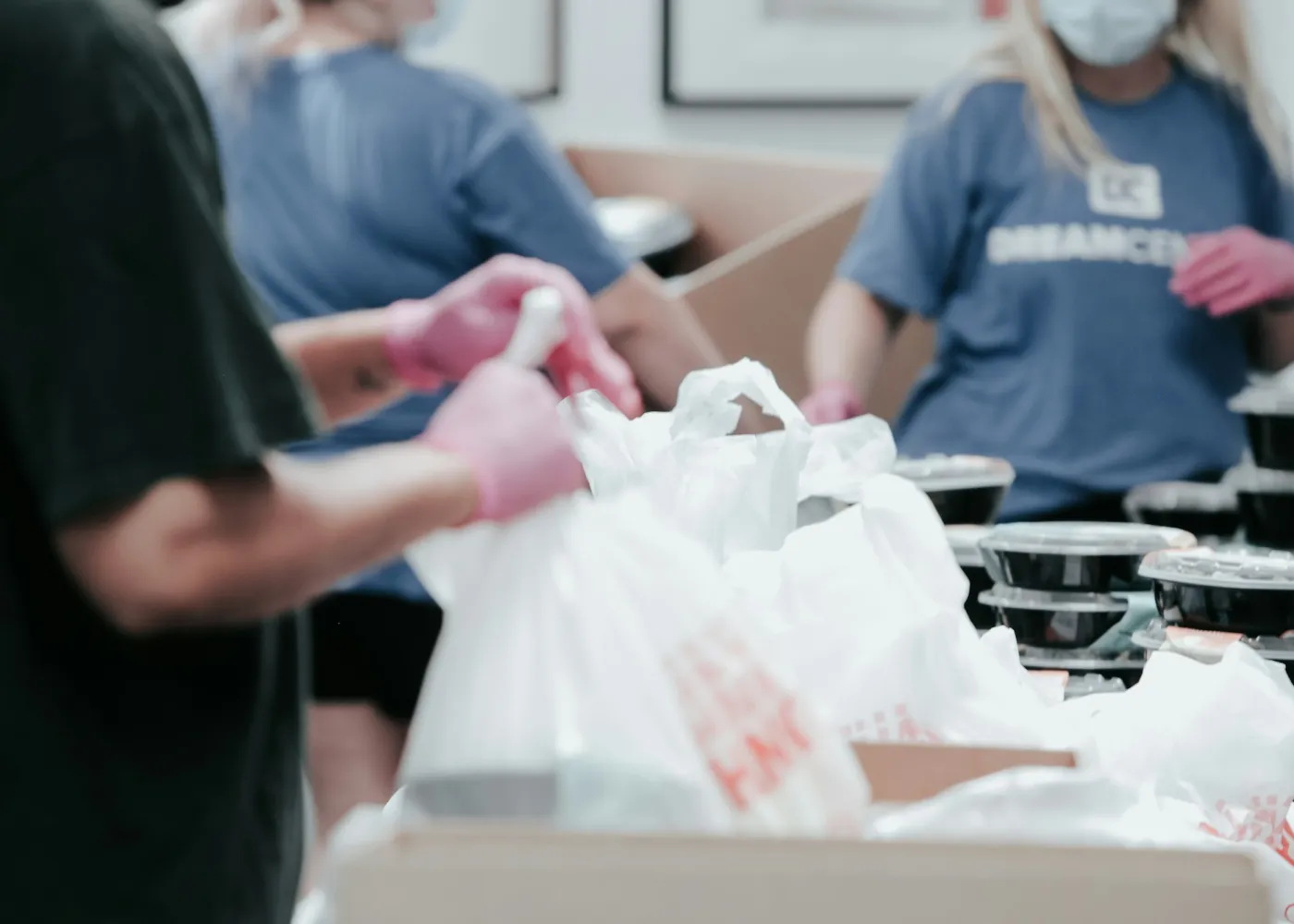 Volunteers packing food bags